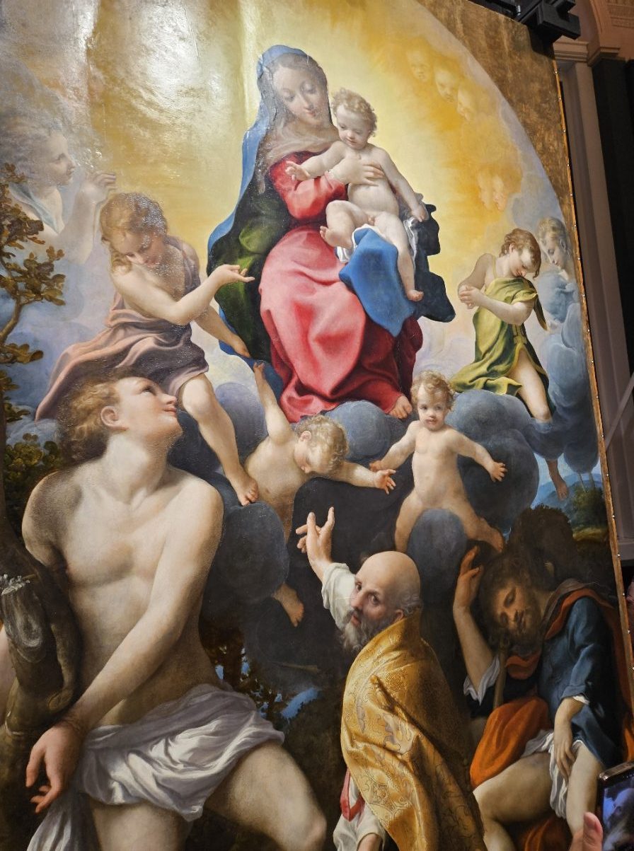 Madonna con bambino in braccio, ai suoi lati putti e santi con un modello del Duomo di San Geminaino a Modena
